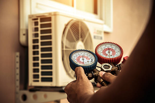 Professional Air Conditioning Service technician working in Springfield, TN